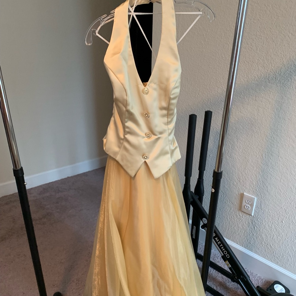 Ballins gold formal gown.